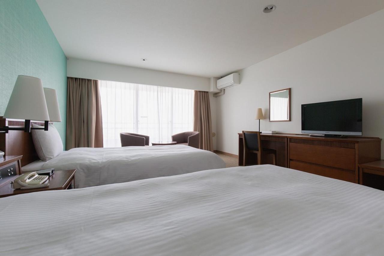 Em Wellness Kurashinohakko Lifestyle Resort Okinawa Szoba fotó